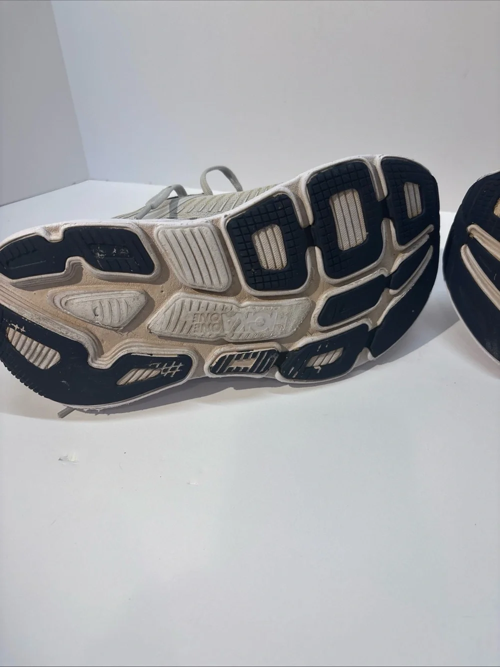 Hoka women’s size 7 gray/peach Bindi 7 style #110531 LRBI in fair condition.